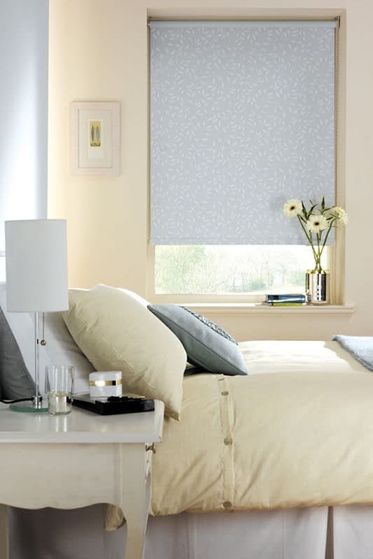 Roller blinds with patterned fabric