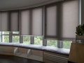 Free-hanging roller blinds