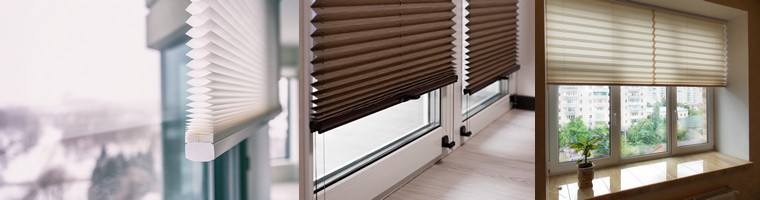 Pleated blinds in various colours fitted in windows